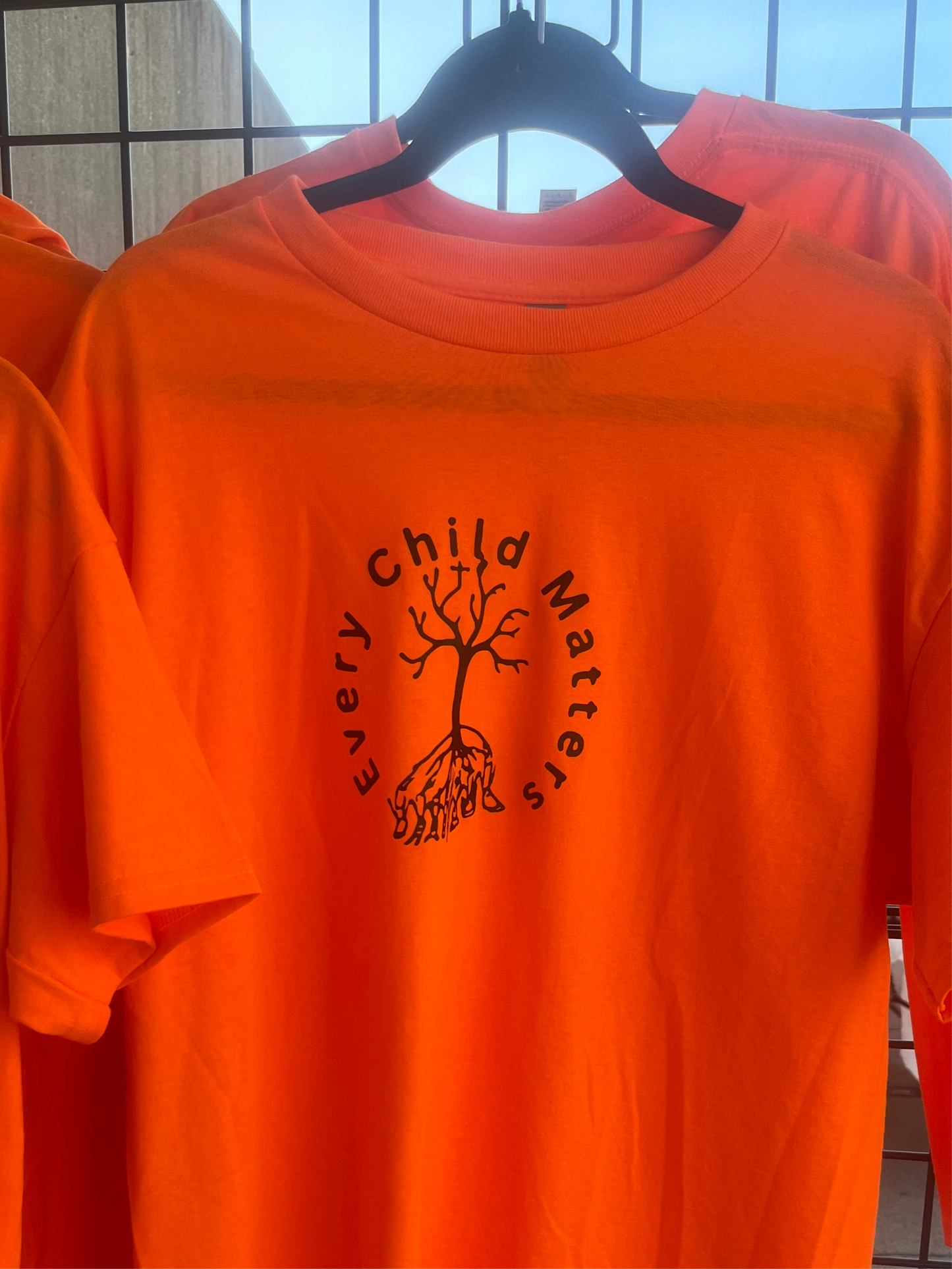 Orange every child matters tshirt residential school tree